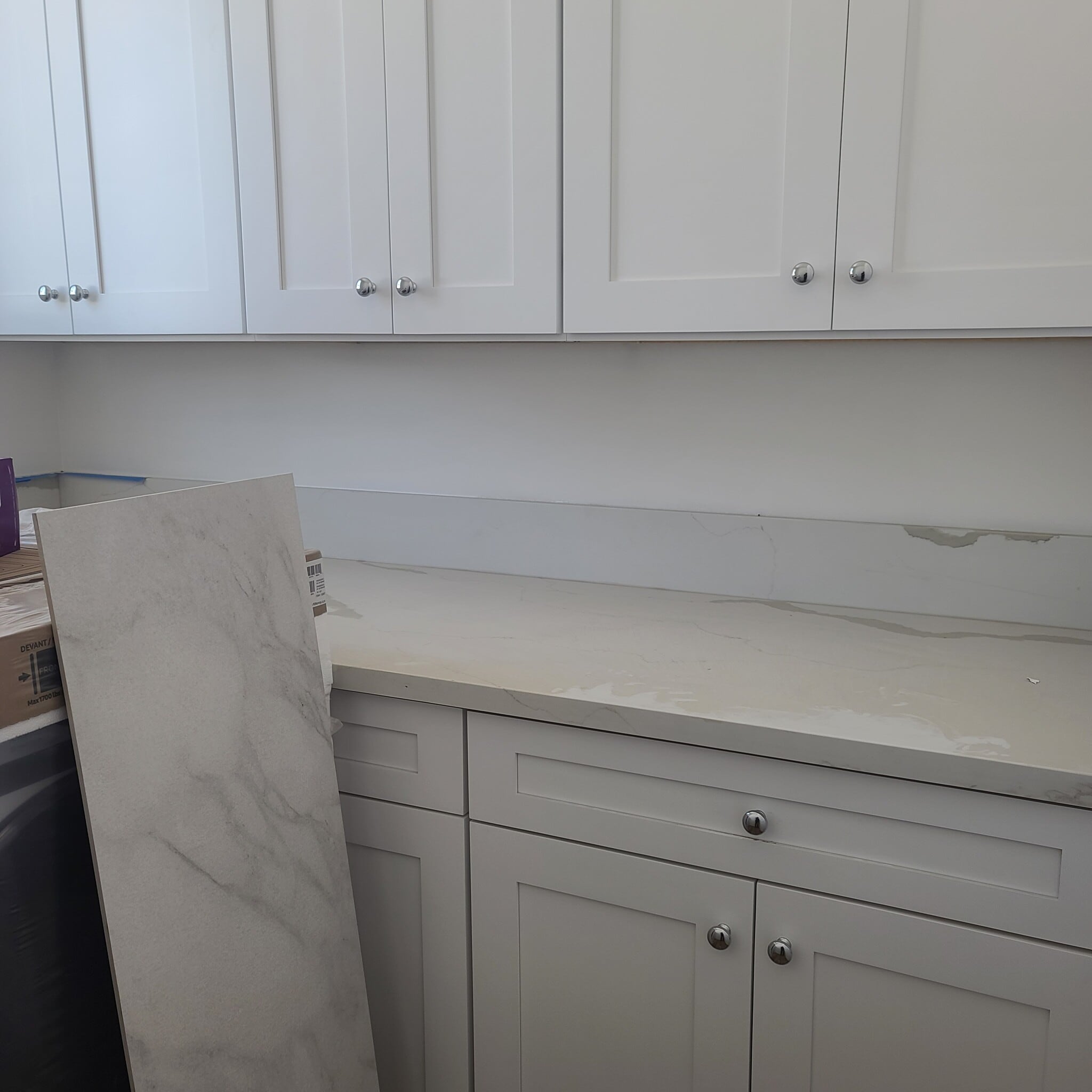 Washer/Dryer Room upper and lower cabinets and work counter - 13826 Bessemer St