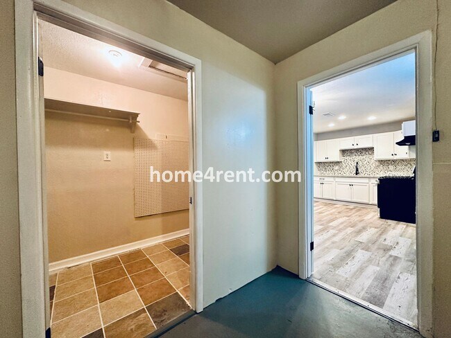 Building Photo - Lovely Three Bedroom Home in KCMO and an Updated Kitchen  w/ Granite and SS Appliances, including...