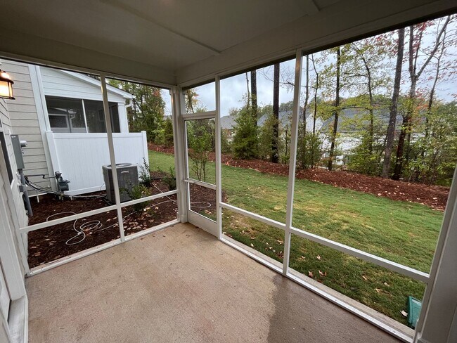 Building Photo - Newly Built 4BD, 3BA Cary Townhome with Modern Amenities and Screened-In Patio
