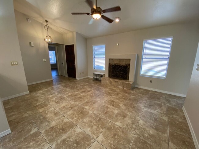 Building Photo - Quaint Retreat: 2BR/2BA Haven with Private Yard, Vaulted Ceilings & Cozy Fireplace