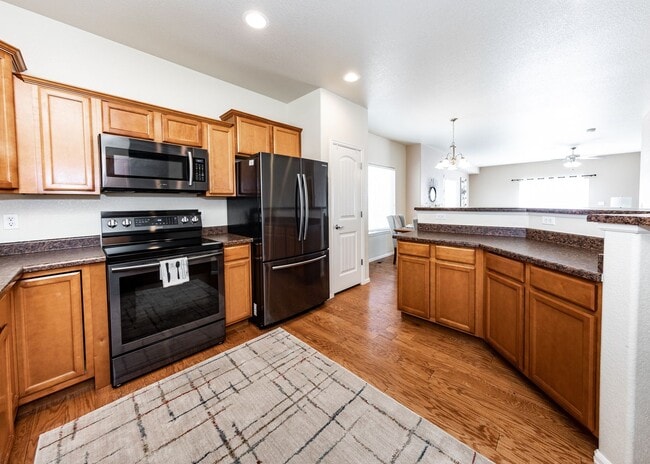 Building Photo - Cute End Unit 3 Bedroom Townhome in Lorson Ranch Next to Open Space