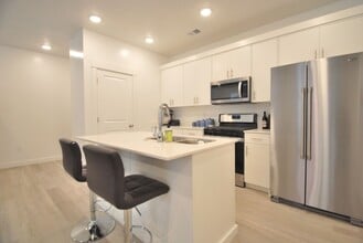 Building Photo - Modern 2 Bedroom Townhome with Amenities Included