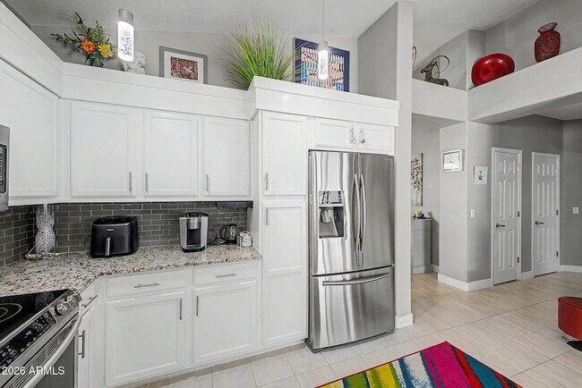 Building Photo - 9026 W Escuda Dr