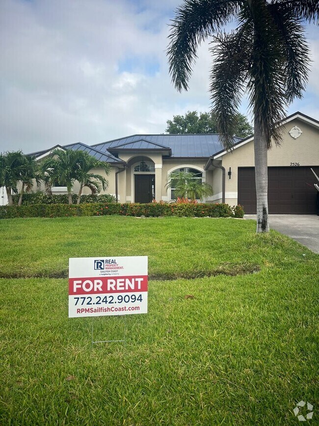 Building Photo - Convenient 3/2/2 PSL Home with Backyard Oa...
