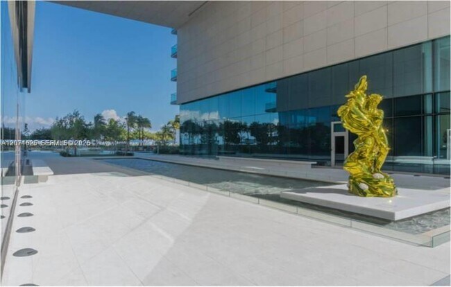 Building Photo - 10201 Collins Ave
