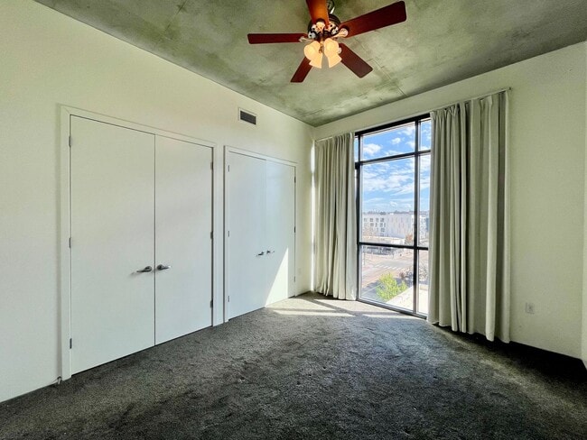 Building Photo - Stunning Corner Loft in East Village with Floor-to-Ceiling Windows & City Views!