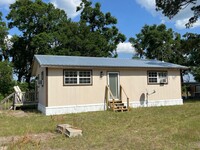 Building Photo - Charming Updated 2-Bedroom Home on 1 Acre ...