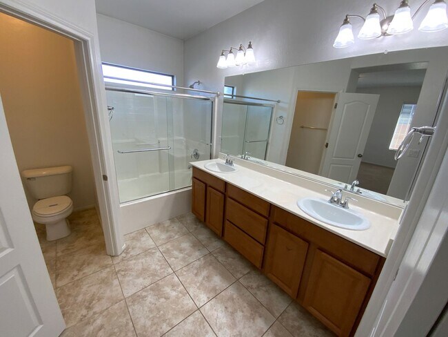 Building Photo - NW 3 BEDROOM WITH A LOFT, CLOSE TO COMMUNITY PLAYGROUND