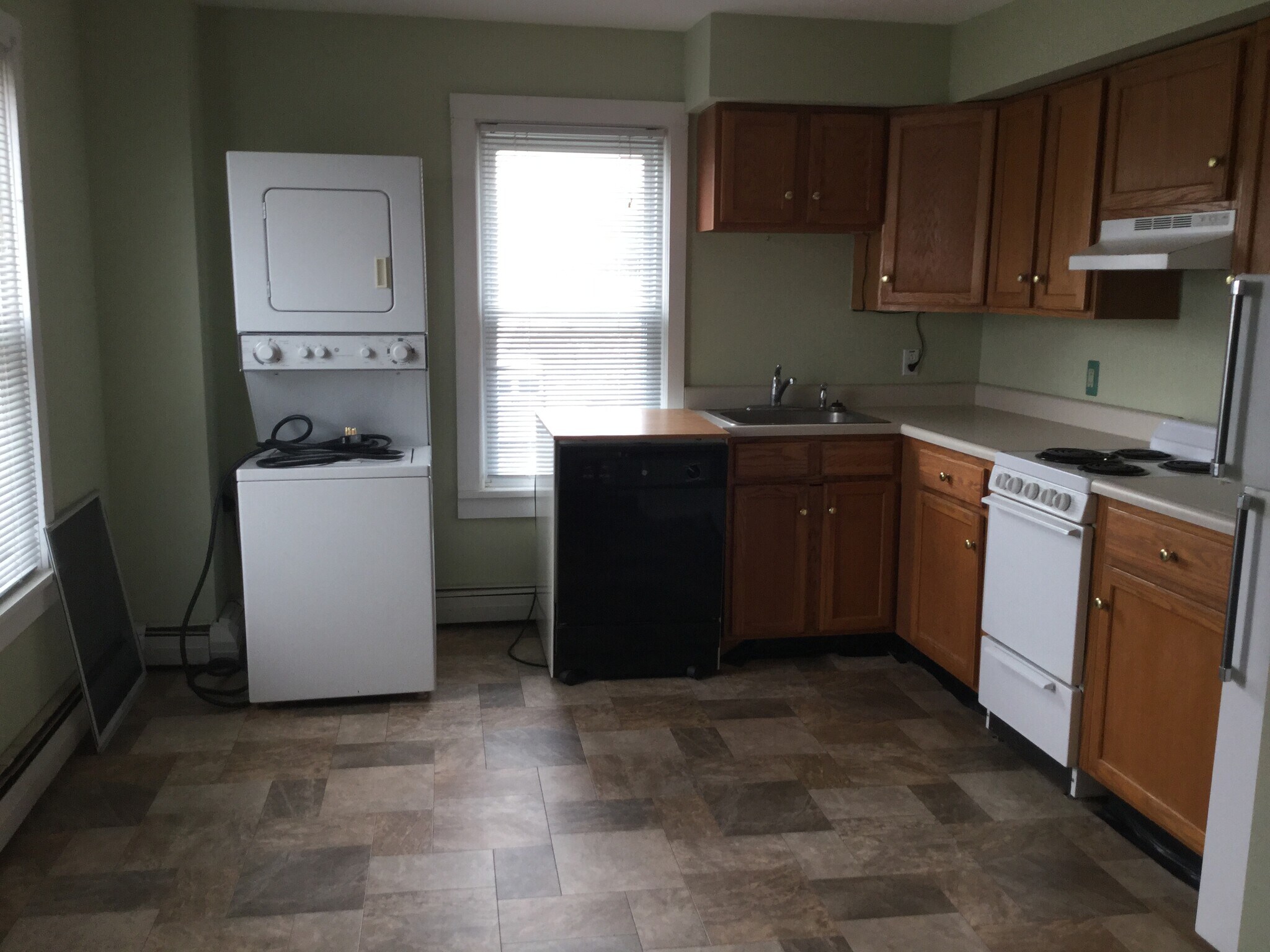 Kitchen, New Pergo hardwood floors, W/D will be enclosed. - 424 Creek Farm Road