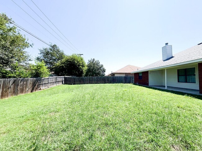 Building Photo - Available NOW!!!! Open floor plan features living room with fireplace, dining area, and large kit...