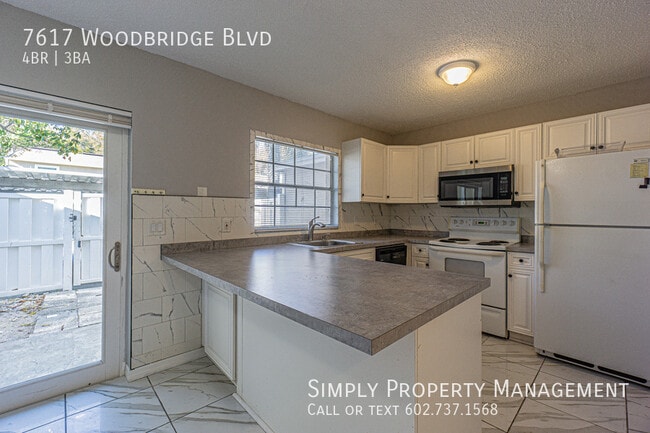 Building Photo - 7617 Woodbridge Blvd