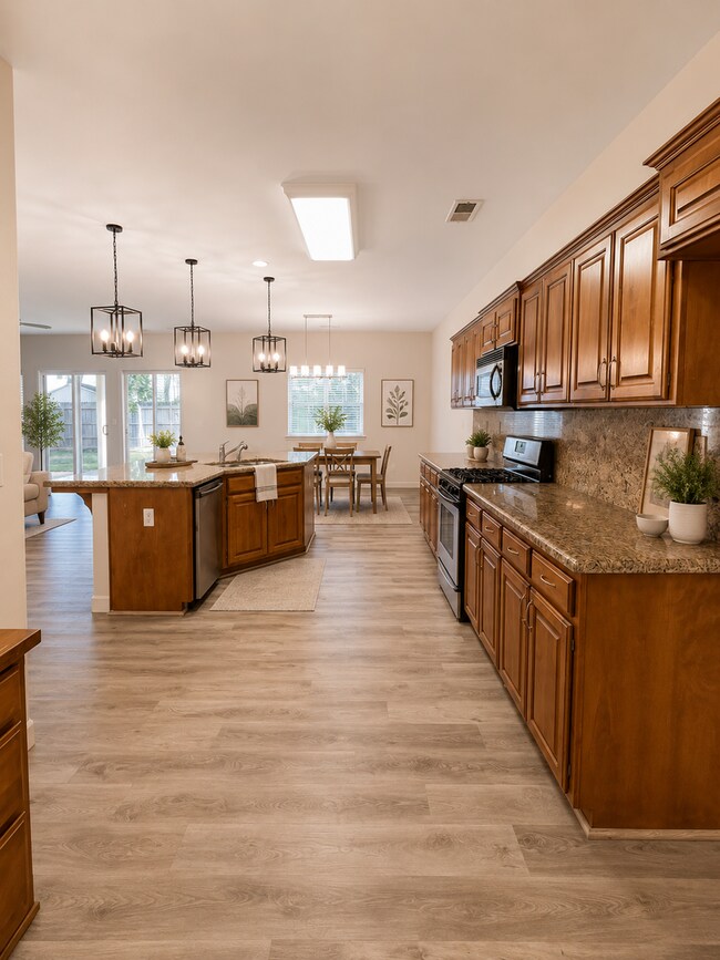 Building Photo - Spacious 4BR/2BA Family Home in Fowler – Move-In Ready for Summer!