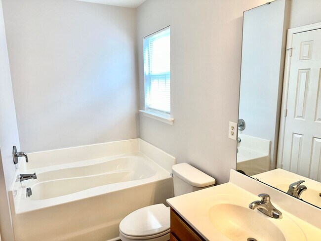 Building Photo - Updated 4BD, 2.5BA Raleigh Home With a 2-C...