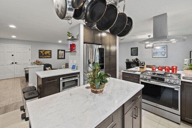 Building Photo - Updated Smart Home with Entertainer's Basement, Trex Deck & Minutes from Fort Carson
