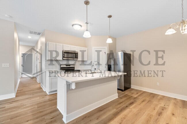 Building Photo - 212 W May St