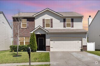 Building Photo - Rent this beautiful 4-bedroom, 3-bathroom ...