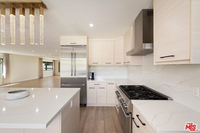 Building Photo - 11700 Woodley Ave