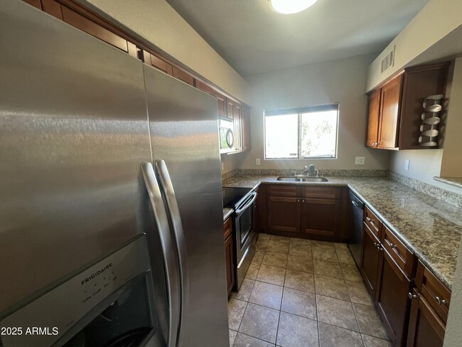 Building Photo - 1287 N Alma School Rd