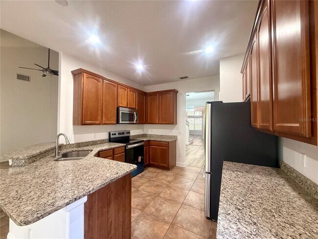 Building Photo - 6984 Brescia Way