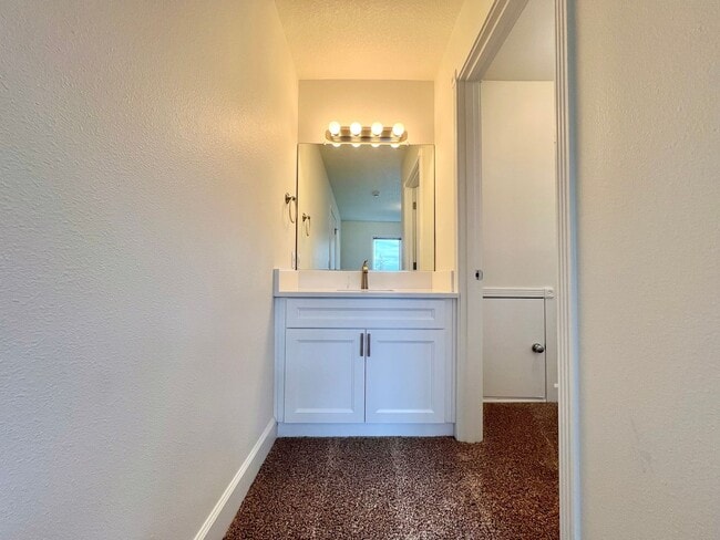 Building Photo - NEWLY RENOVATED! Spacious 2-Bedroom Townhome in a Charming Cul-de-Sac!