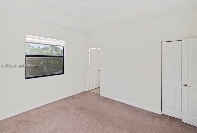 Building Photo - 11091 W 32nd Ln