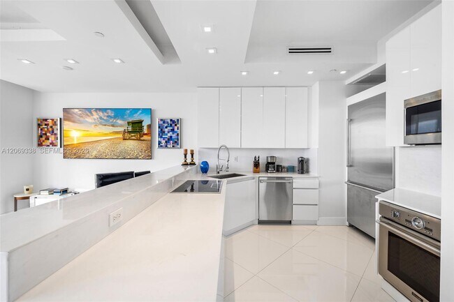 Building Photo - 4779 Collins Ave