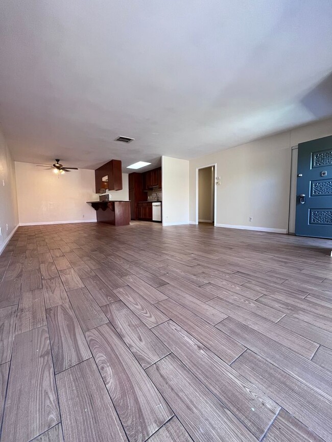 Building Photo - SINGLE STORY 3 BR/ 2 HOME WITH 2 CAR GARAGE