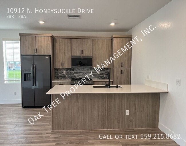 Building Photo - 10912 N Honeysuckle Dr