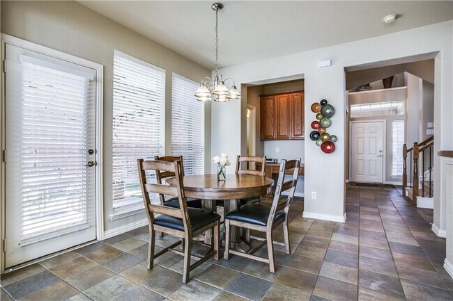 Building Photo - Immaculate home on a beautifully landscaped lot, tandem garage, plenty of storage!