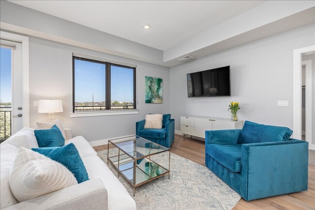 Building Photo - COME HOME TO REFINED DOWNTOWN LUXURY CONDO...