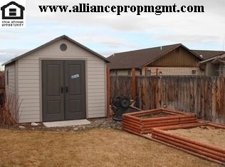 Building Photo - Centrally-located 3 bedroom home with paved RV parking.