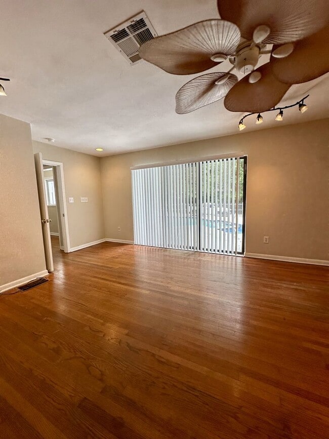 Building Photo - Upgraded 4BR/3.5BA Pool Home in Prestigiou...