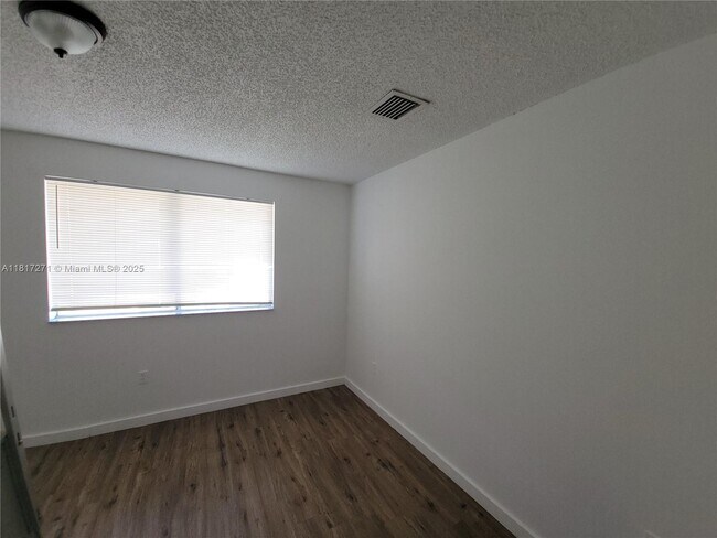 Building Photo - 6965 NW 173rd Dr
