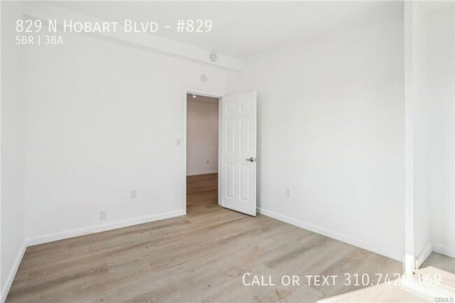 Building Photo - Luxe Living at 825 N. Hobart Blvd. – Where...