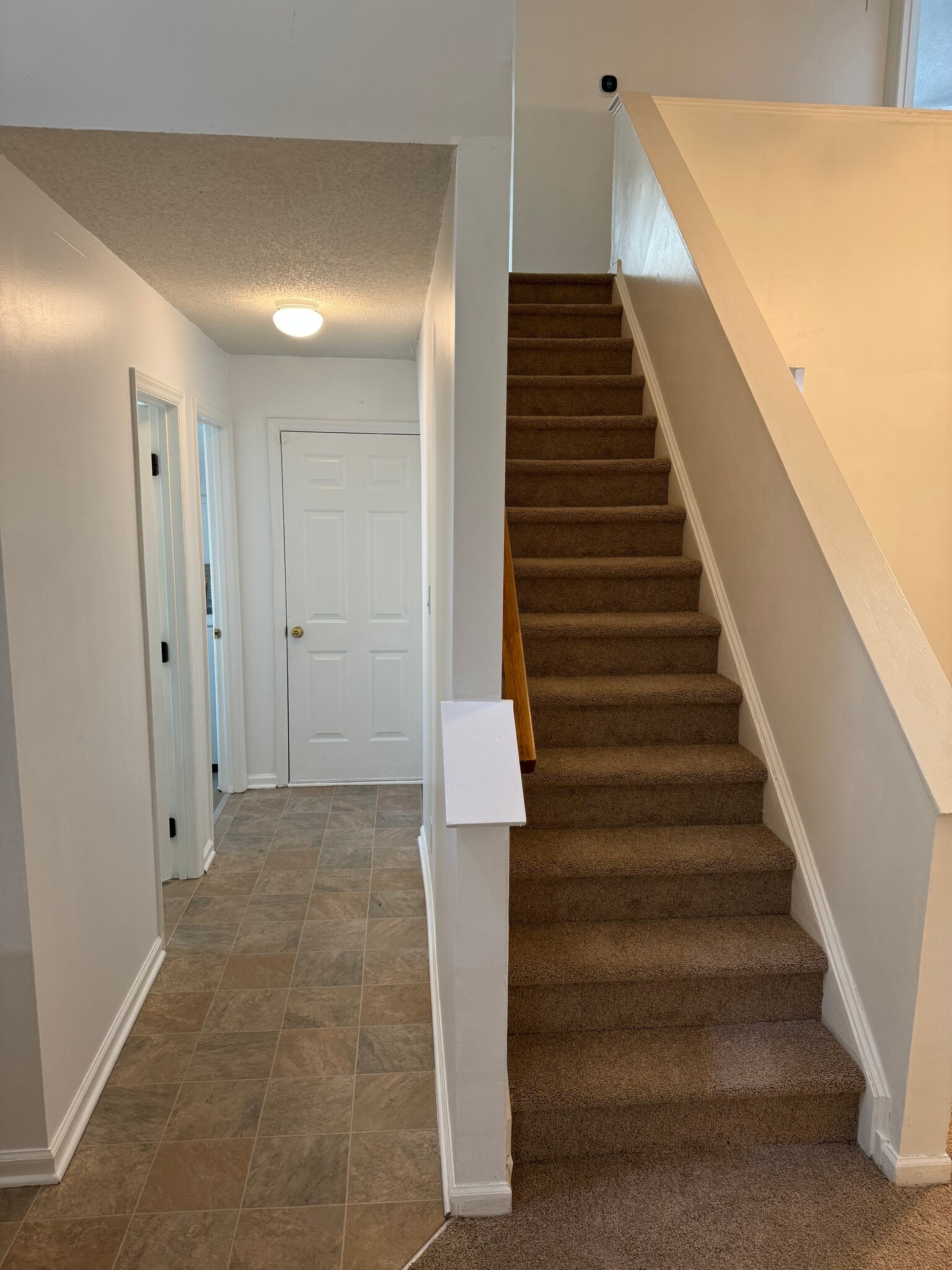 Garage Entrance + Stairs - 632 Penncross Dr