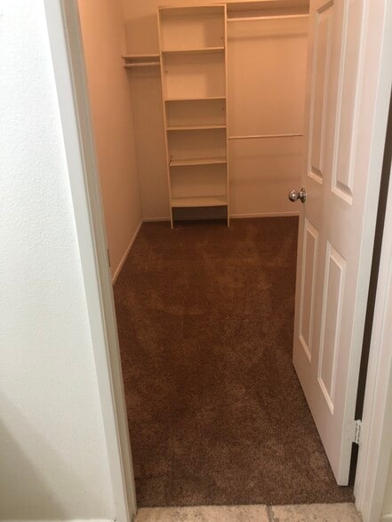 Walk in closet for master bedroom area . - 6395 Delgado Ln
