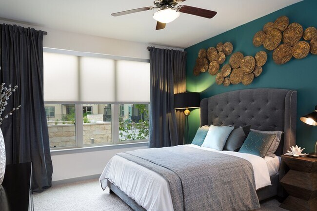 Building Photo - Spacious Than You Think & Richly Featured