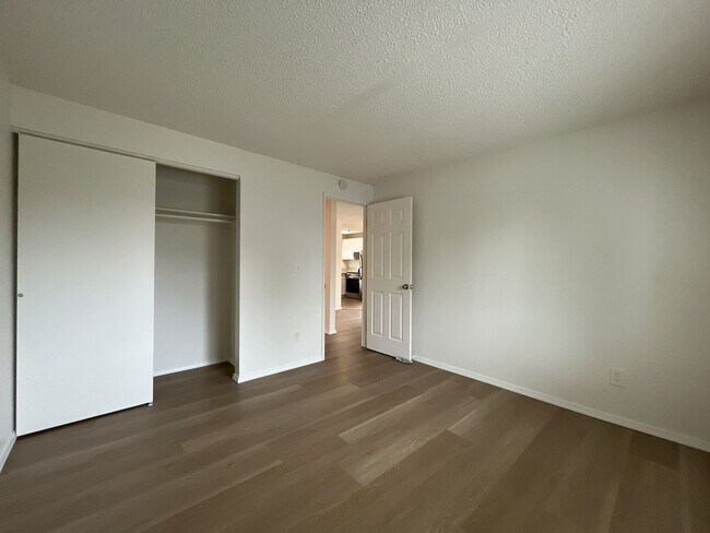 Building Photo - Inviting 2 Bedroom Home with Open Layout, Stainless Steel Appliances & Private Outdoor Retreat