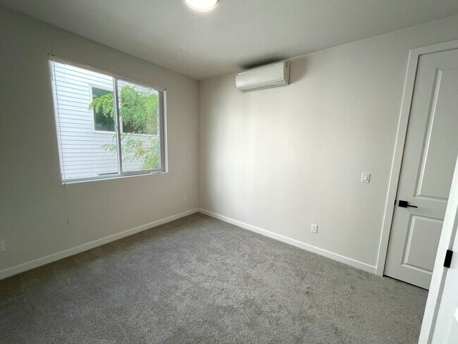 Building Photo - Newly Built Townhome-Style Unit with Laundry, A/C, Private Patio!