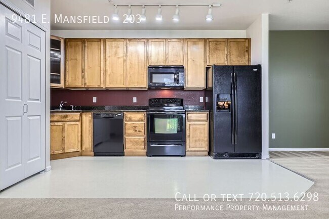 Building Photo - 9481 E. Mansfield-203