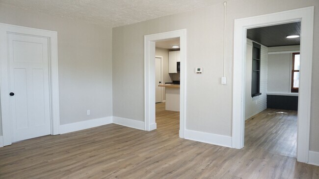 Building Photo - Charming Fully Remodeled Home with 4 Garage Stalls & Park Access in Central Minot
