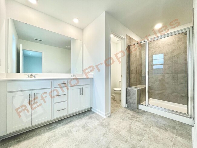 Building Photo - Brand New 3 Story, 4 bedroom, 3.5 bathroom Townhome Featuring a 1st floor Guest Suite, 2 Car Gara...