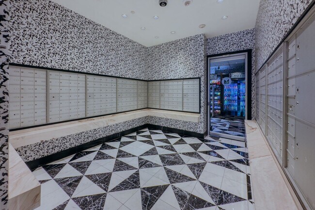 Building Photo - 6th Floor 2-Bedroom Condo with Stunning La...