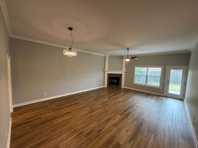 Building Photo - Elegant, Low Maintenance Townhome Designed for Elevated Everyday Living!