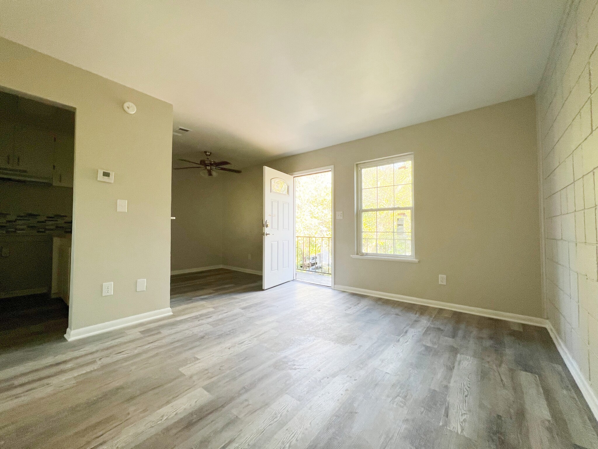 Step into a bright and sunny day from this inviting living room. - 2125 Banita St