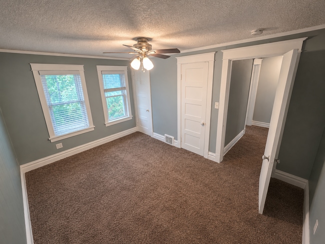 Building Photo - Available July 1st! Single family home with fenced-in backyard!