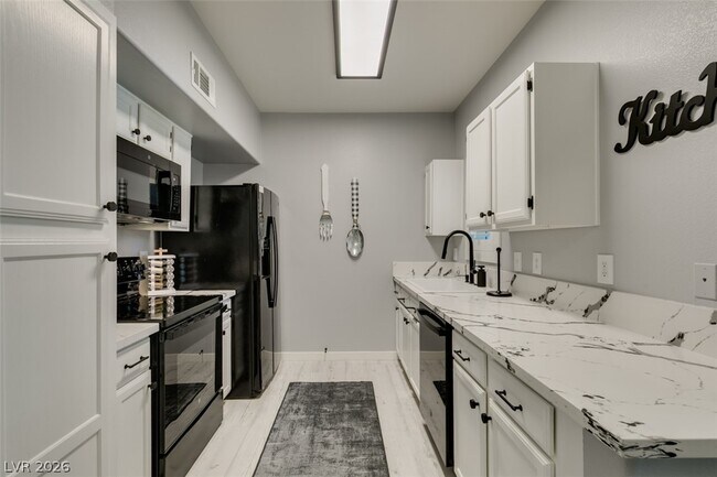 Building Photo - 7255 W Sunset Rd