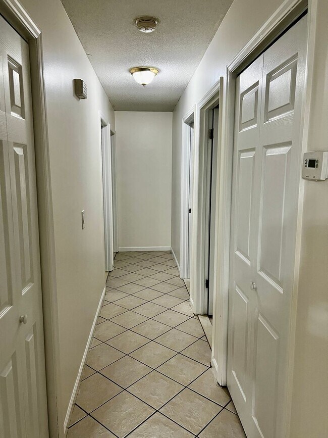 Building Photo - Charming 3-Bedroom, 2-Bathroom Home with Sunroom & Flex Room