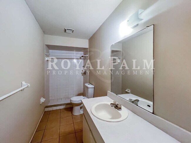 Building Photo - Start Fresh in Fort Myers Before the Ball Drops  – Renovated 3BR/2BA Duplex Sleighing with an Ope...