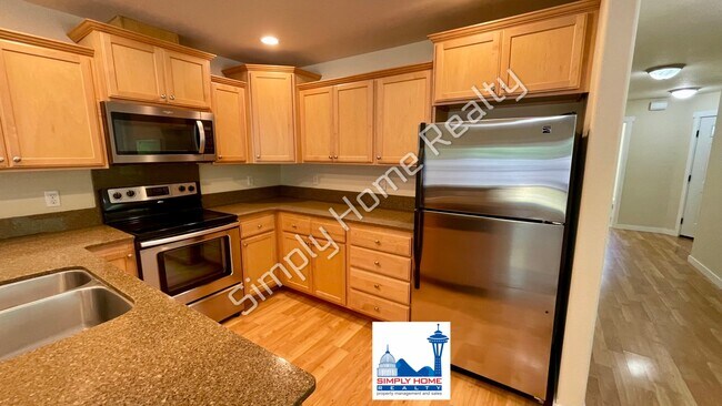 Building Photo - Welcome to Your Corner-Lot Retreat!